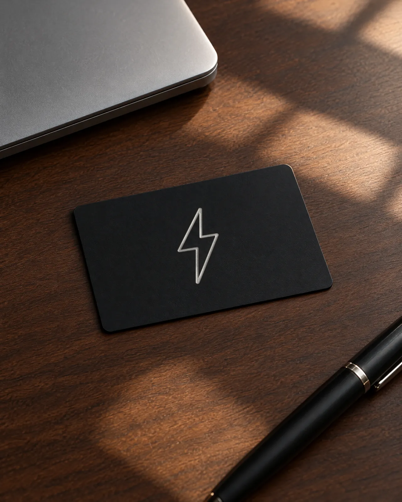 A matte black ZapCard on a desk