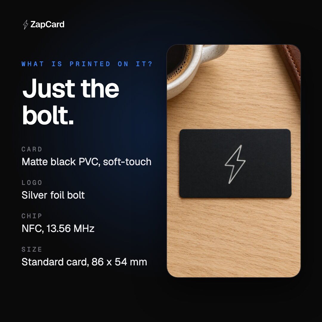 A matte black ZapCard on an oak desk next to a coffee